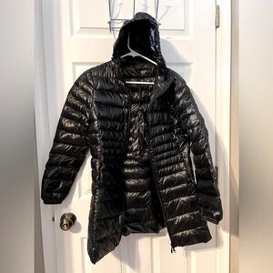 Ladies ( junior) XL black down puffer jacket with stuff sack.
